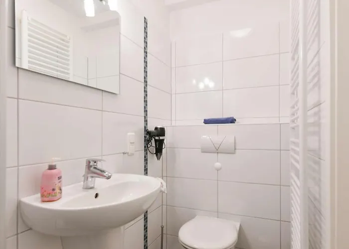 Апартаменты Familienhaus Im Dorfgroden 27 Zugvogel Вангероге