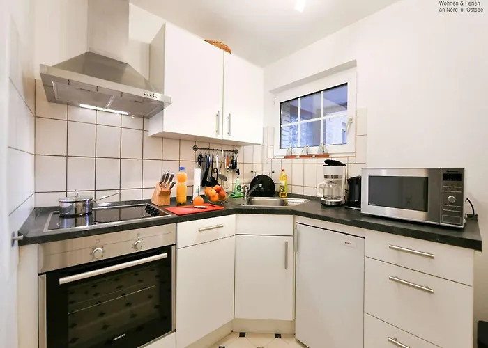Апартаменты Familienhaus Im Dorfgroden 27 Zugvogel Вангероге